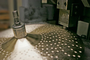 A Turkish cymbal by Zildjian goes through the hammering process.