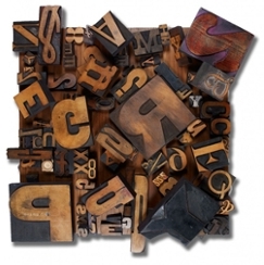 Lloyd Schermer, “Falling Type,” Antique Wood Type Sculpture