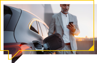 a person next to an electrical vehicle